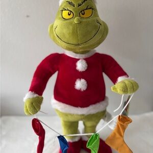 The Grinch Holding Stockings Plush Greeter 19.69inch NWT.